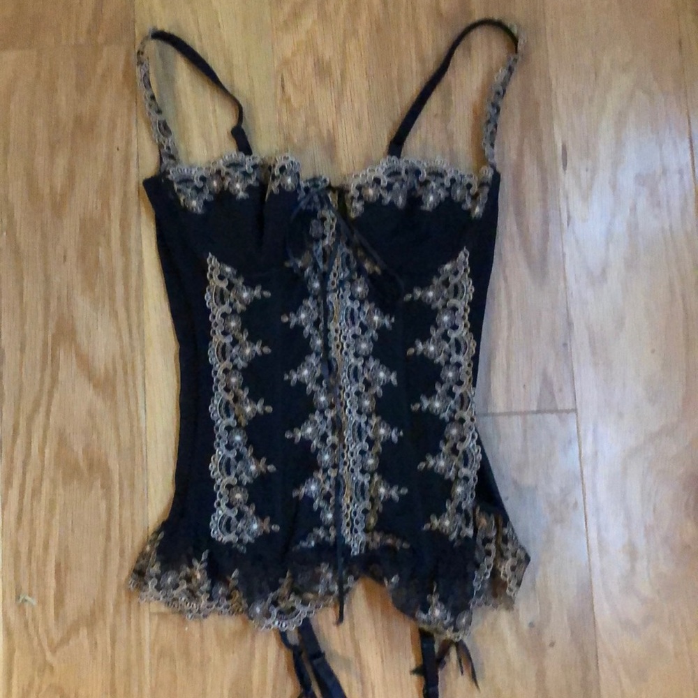 Ornate black and gold lingerie piece